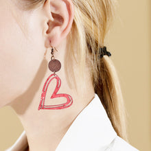 Carregar imagem no visualizador da galeria, Cutout Heart Shape Wood Earrings
